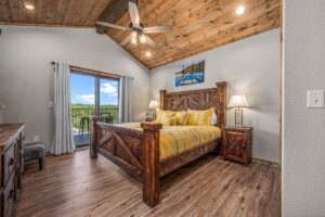 Lower deck with private hot tub at Jax Klassic, a six-bedroom Table Rock Lake home at Indian Point near Branson that sleeps 16