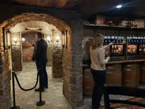 Candlelit self-pour wine cave lounge at Cellar 417 Branson West restaurant