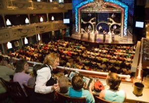 Silver Dollar City Showboat dining room with live entertainment stage and family-style table seating Table Rock Lake Branson