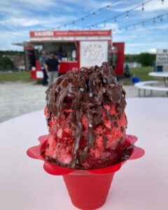 Chocolate covered strawberry stuffed snow cone shaved ice at Swick's Shaved Ice Branson Missouri