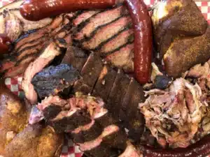 Pecan-smoked brisket platter with sides at Big D’s BBQ in Branson, Missouri