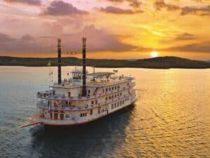 View of Table Rock Lake Ozark Mountains from the deck of Silver Dollar City's Showboat during sunset dinner cruise Branson