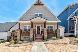 Full gourmet kitchen and large dining table set for a big group in a Branson vacation rental