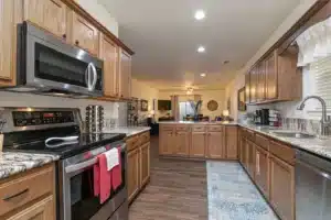 Open kitchen and dining area of The Family Showstopper condo, a Branson vacation rental near the 76 Strip