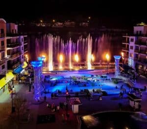Branson Landing waterfront fountain show at night couples romantic evening Lake Taneycomo Branson Missouri