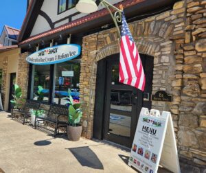 Sweet Shack storefront on Historic Downing Street in Hollister, Missouri — homemade ice cream and smash burgers
