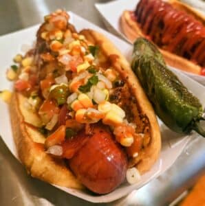 Lala's Street Food hot dog served with chips
