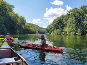 Canoes beached on an Ozark gravel bar during a float trip near Branson Missouri