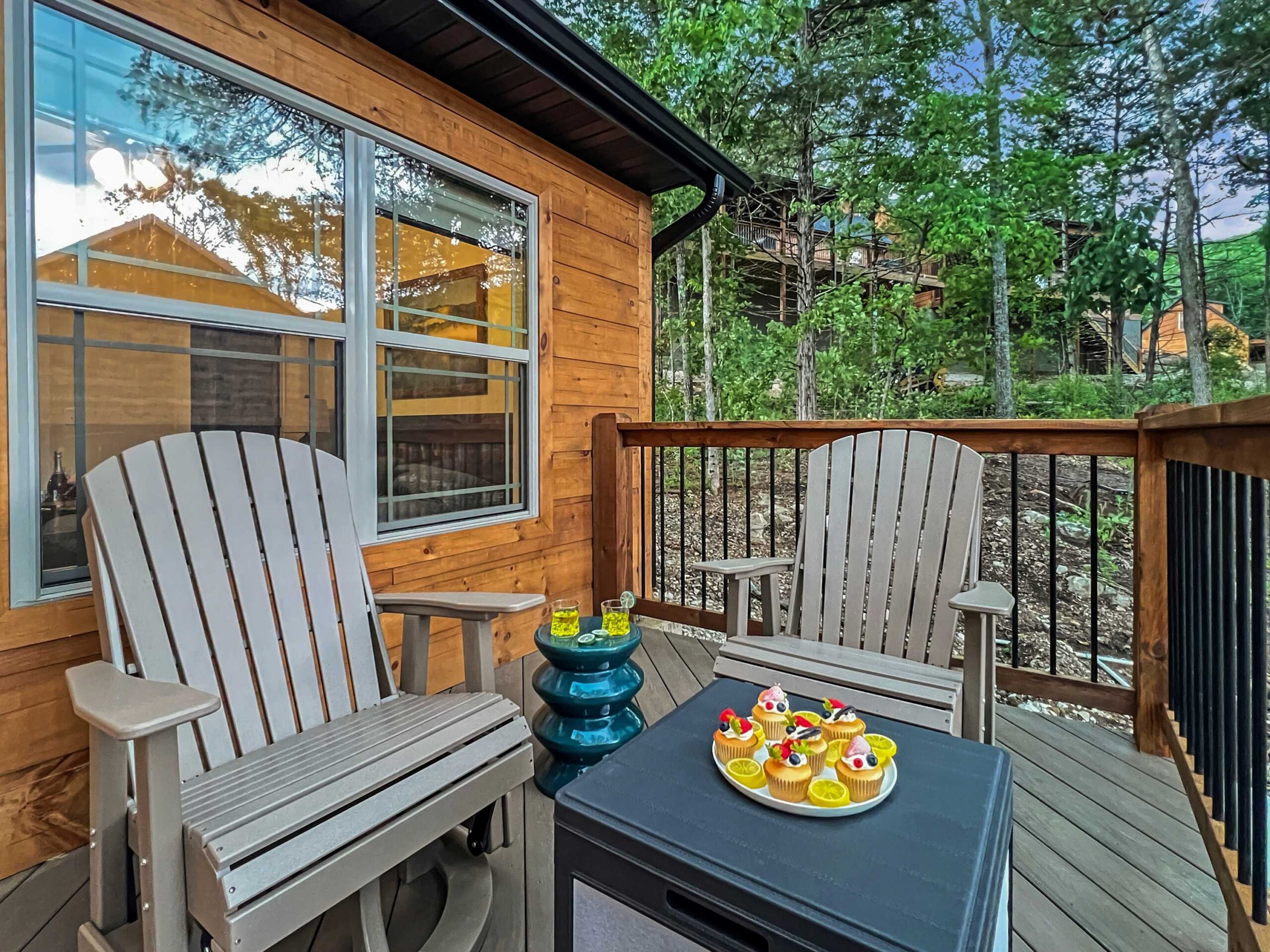 Cozy two-bedroom cabin at Tall Timbers Camp near Branson with a private deck beside wooded hiking trails