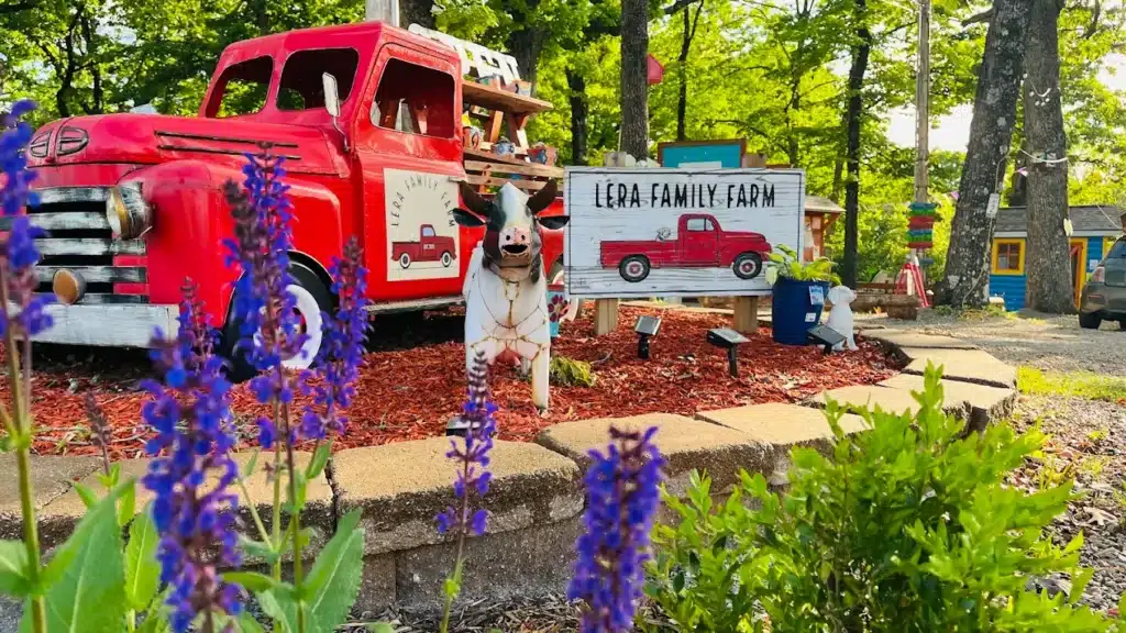 Evening outdoor seating in the Lera Family Farm courtyard around Lala's Street Food in Branson West