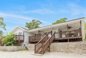 Lakefront covered porch at Lighthouse Lodge Captain's Quarter with Table Rock Lake views