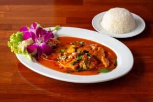 Bowl of Thai curry and rice at a Branson Asian restaurant