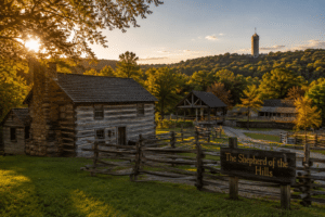 Inspiration Tower rising over the Shepherd of the Hills homestead in Branson Missouri
