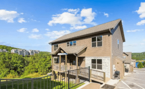 Lakefront exterior and deck at Elegance, Unwound on Table Rock Lake, illustrating Branson cabins vs condos