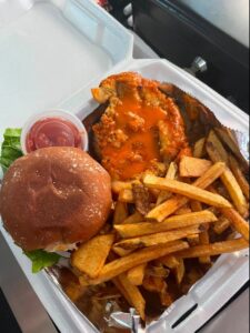 Chicken sandwich and fries from After Bite Kitchen, an alpha-gal friendly food truck