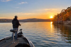 Autumn angler fishing from a boat on Table Rock Lake near Branson